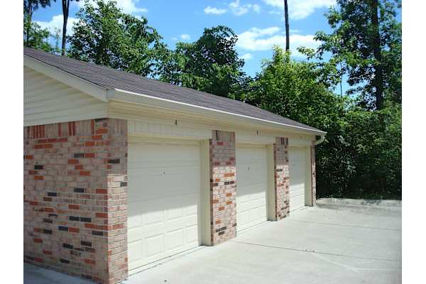 Two garage doors are closed.